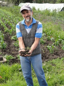 Pacho Gangotena showing what fertile soil looks like.